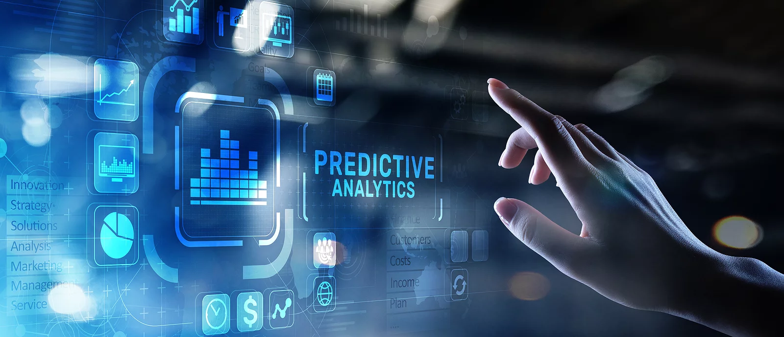 Hand interacting with a digital interface displaying 'Predictive Analytics.'